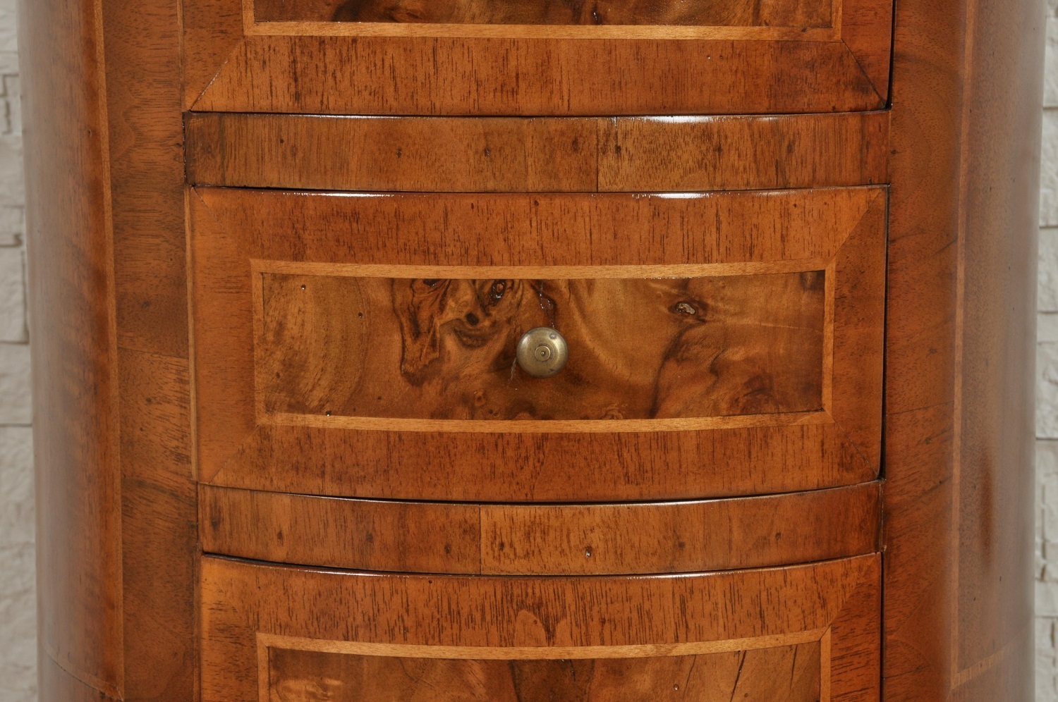hand carved legs of the cabinet inlaid in walnut with a round cylinder shape luxury furnishings handmade in Italy